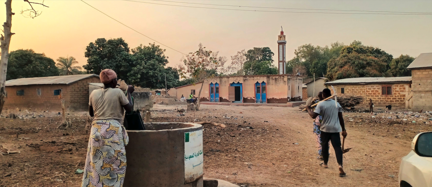 Someone fetching water from a well.